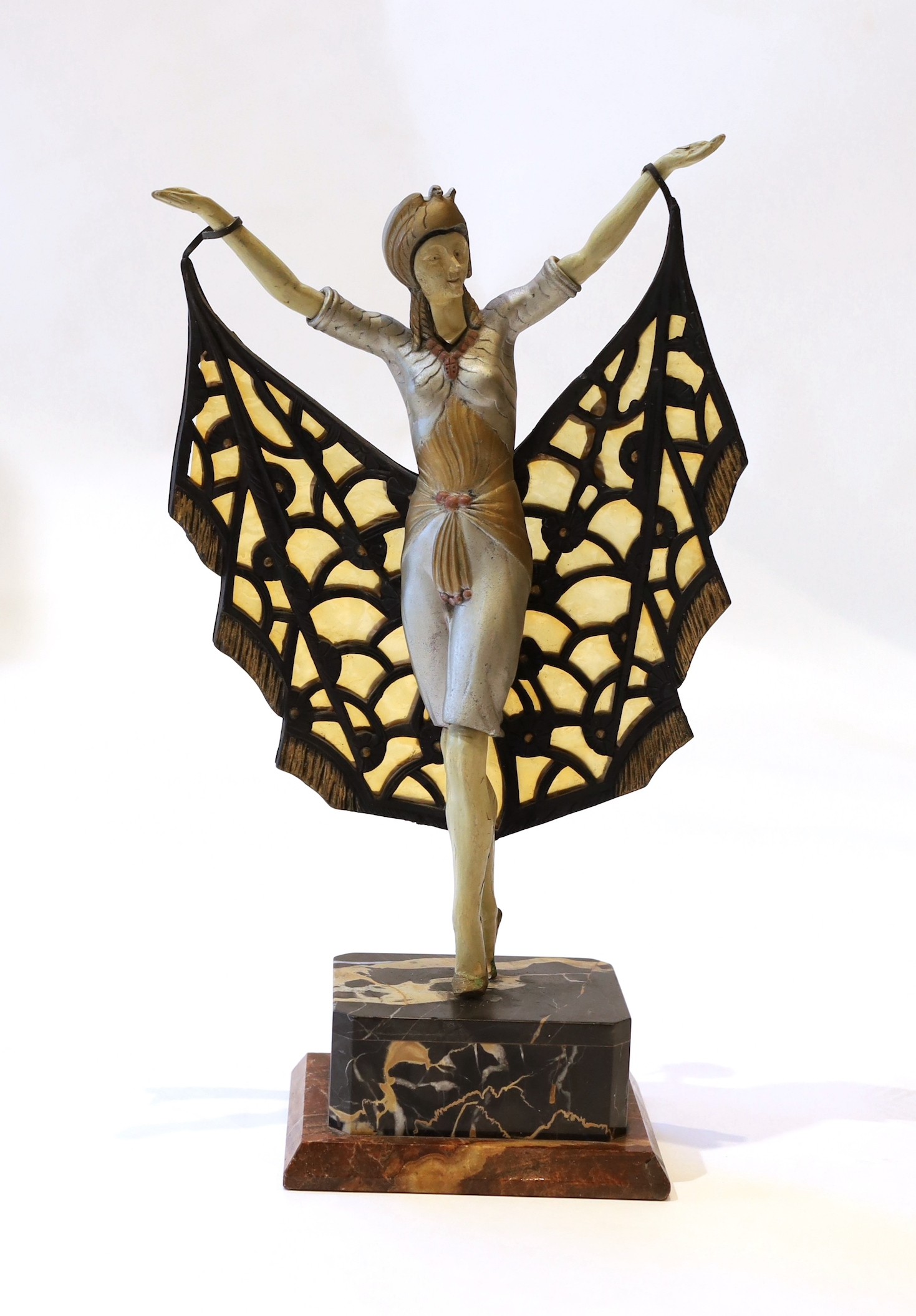 A 1920s French composition and metal butterfly dancer table lamp, on marble plinth, height 42cm